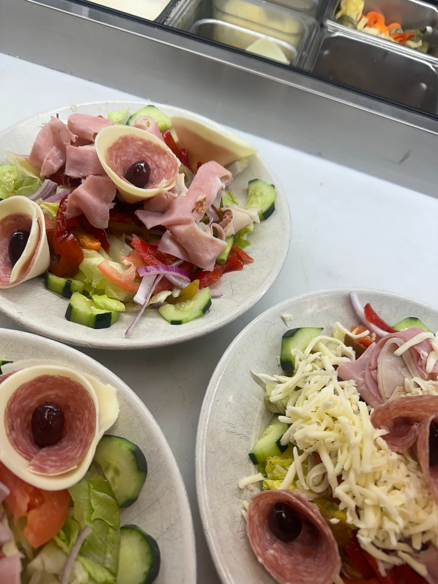 Fresh salads from Palumbo Pizza Hampden Township